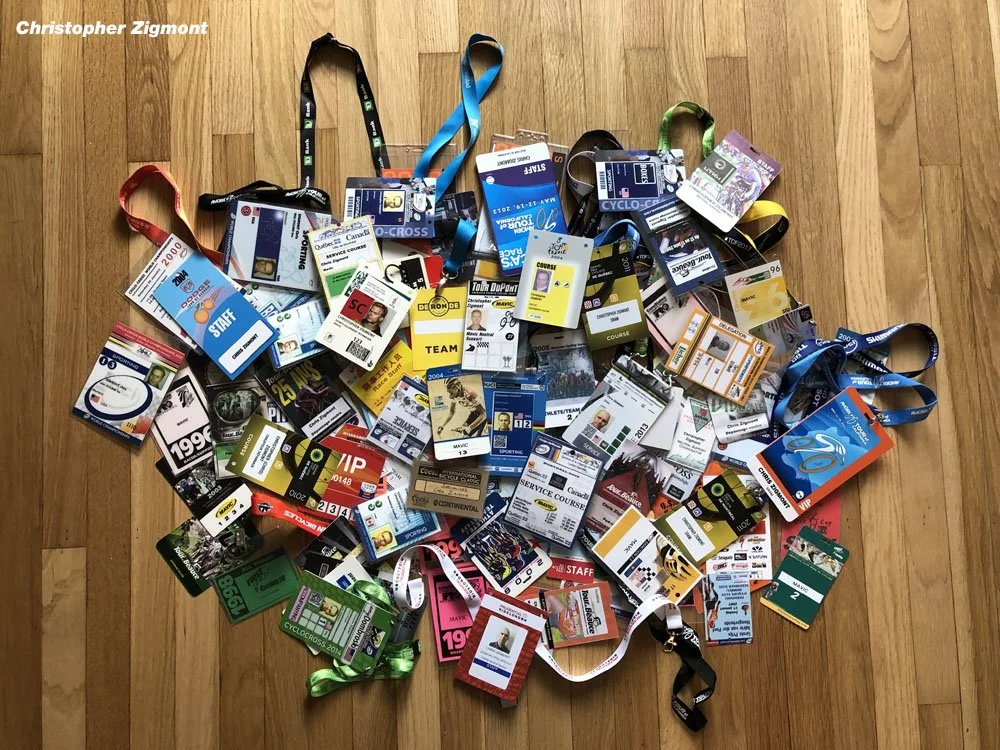 Pile of traditional plastic name tags, highlighting the environmental impact and waste compared to Terra Tag’s plantable and recycled sustainable alternatives