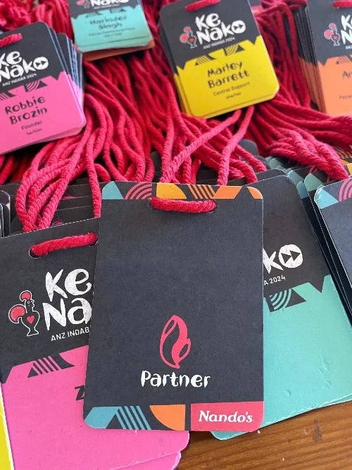 Full colour A7 recycled paper name badges with biodegradable lanyards