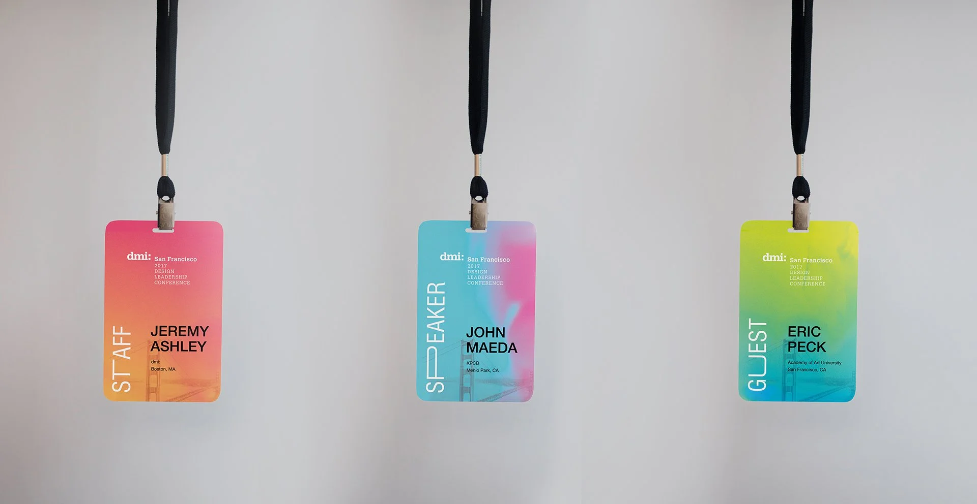 Event badge close-up showing clear hierarchy of name, company, and branding
