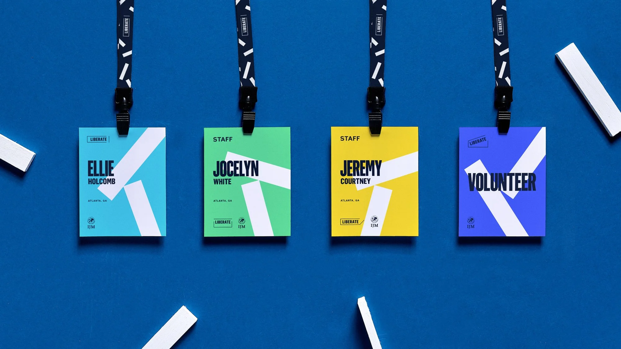 Bold name with lighter supporting text to create hierarchy on a conference badge design