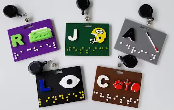 Conference badge with Braille and tactile features to support blind attendees