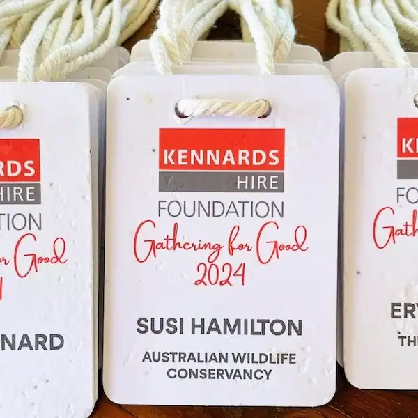 Sustainable event products - A7 seed paper name badges with spot colour design created for Kennards Hire Foundation – handmade from mixed native flower seeds