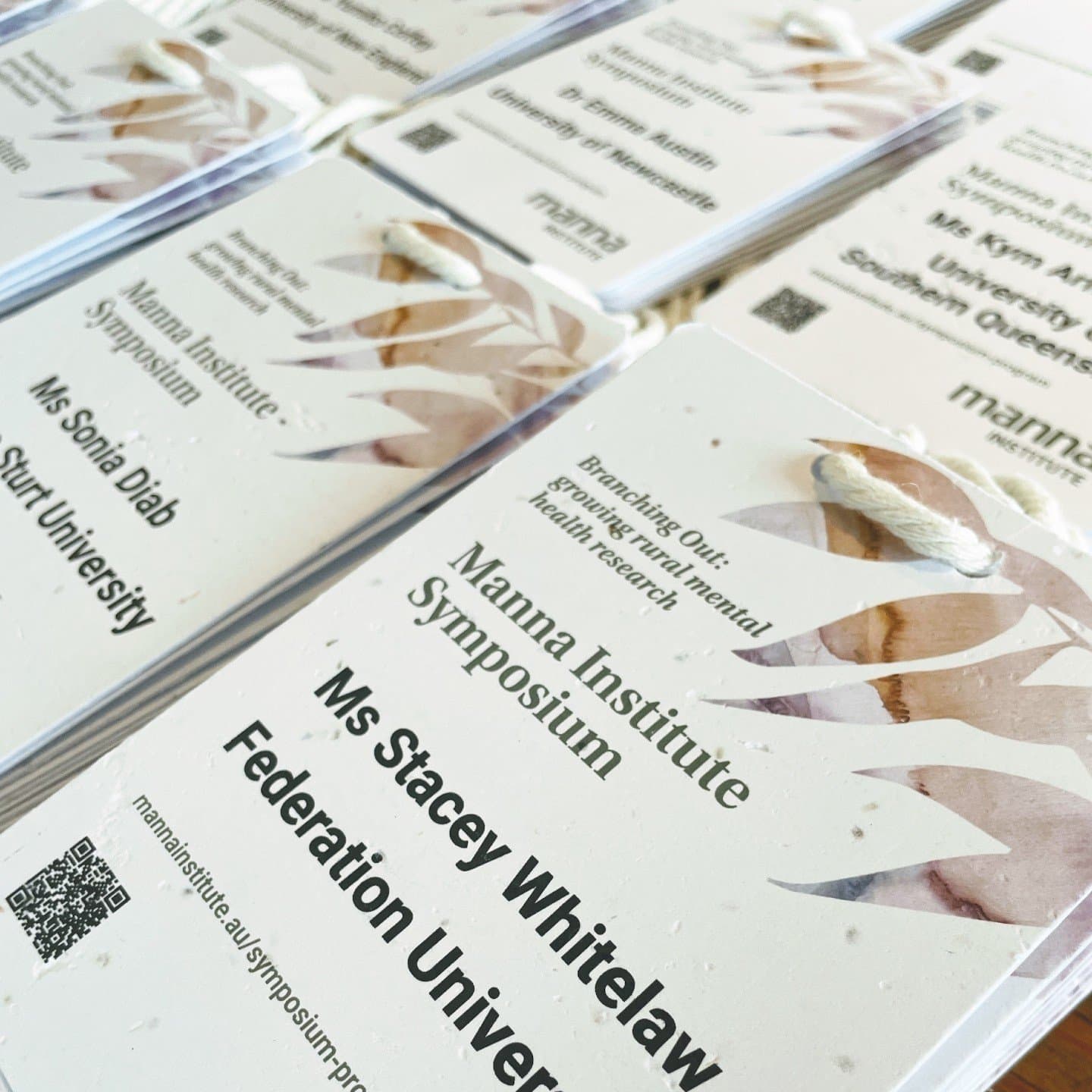 Biodegradable lanyard and eco conference badge made from seed paper with native flower mix