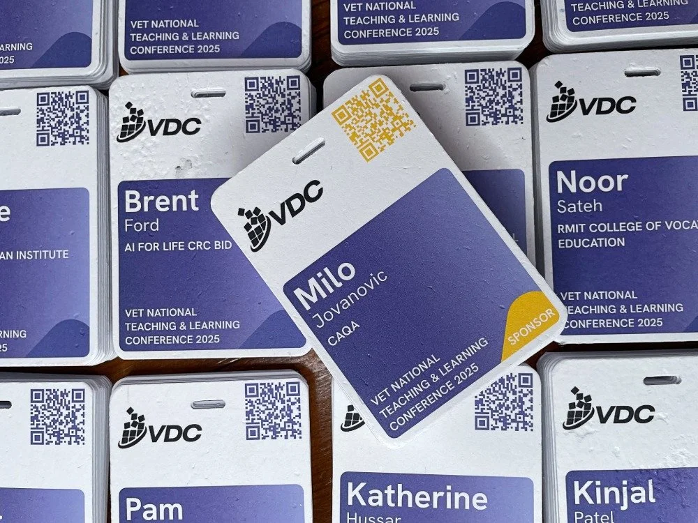 Spot colour A7 recycled name badge for conference