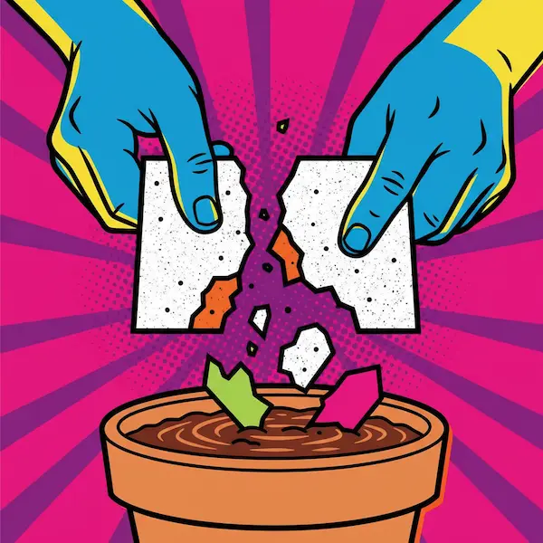 Placing seed paper on soil and covering lightly so seeds can germinate