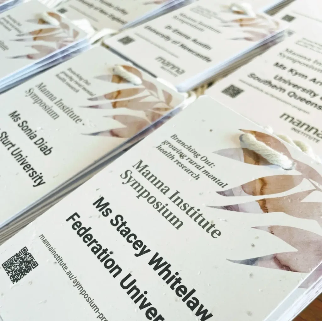 Seed paper name tags created for the Manna Institute Symposium, printed on recycled, plantable card.