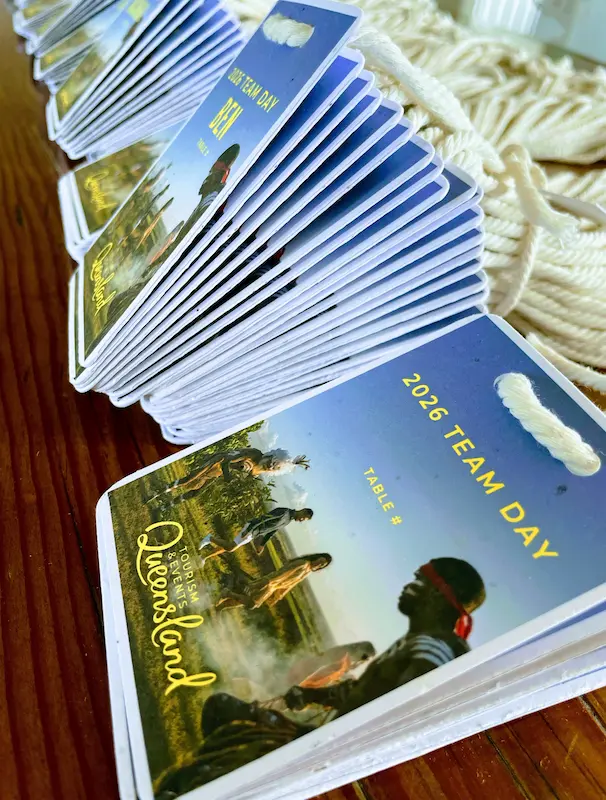 Terra Tag plantable seed paper name tags with custom Queensland branding, handcrafted for a Tourism and Events Queensland sustainable event in Brisbane.