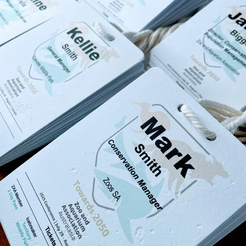 Recycled paper name badges Adelaide government and research conference with plastic free lanyards and professional event design.