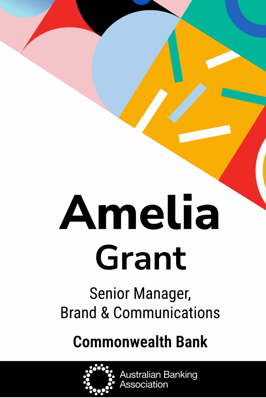 Leadership conference badge with a colourful geometric header, centred name and black logo footer